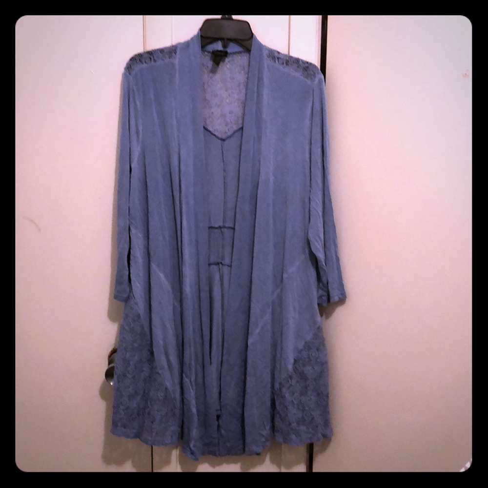 Light blue cardigan.